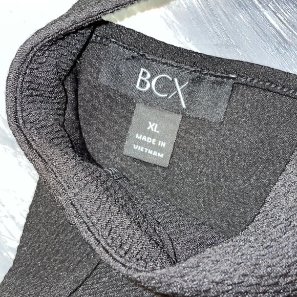 BCX XL black peplum top. Never worn. Fits like a L - Picture 4 of 6